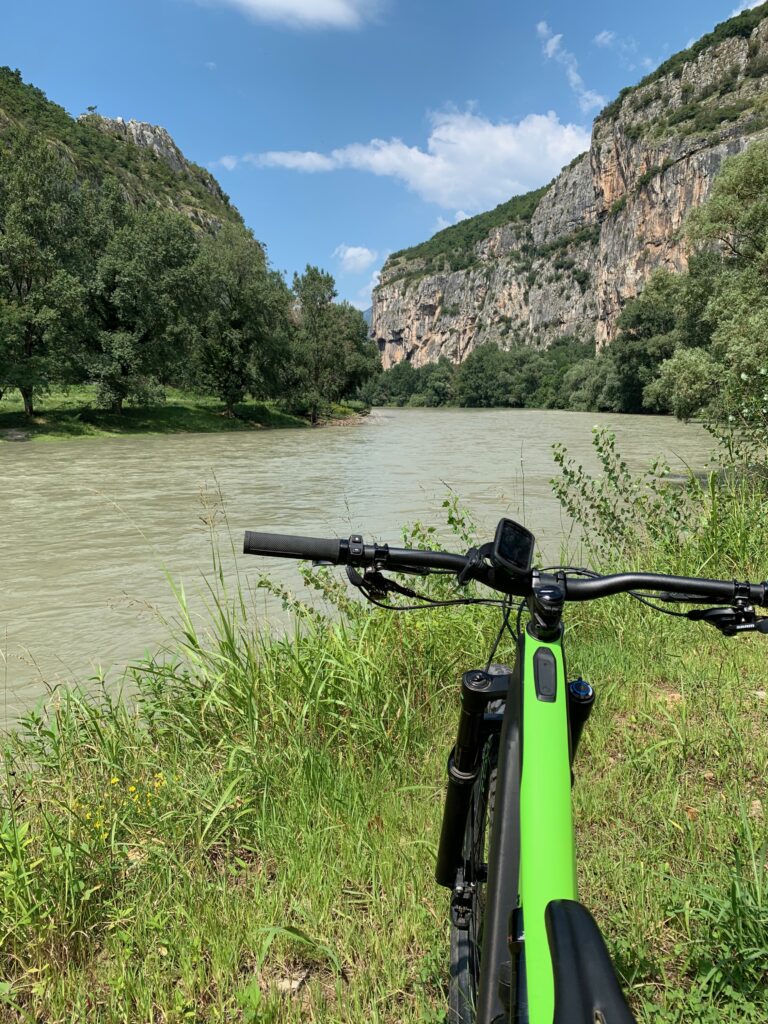Ebike ride on cycle path along Adige river Trentino